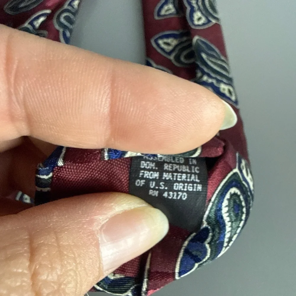 Manhattan Neck Tie necktie featuring a blue and white paisley pattern